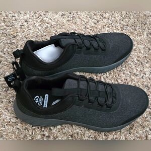 Size 9.5 slip on sneakers.